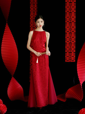 Red cheongsam wedding dress with intricate floral design, styled for traditional bridal engagement or toasting events.