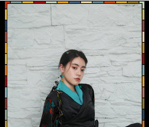 Aqua floral inner layer and black sleeveless pinafore dress product look