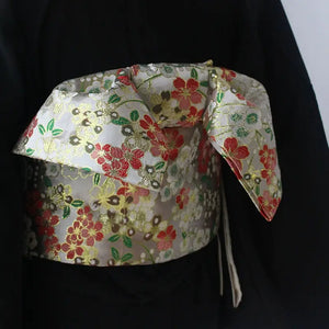 Brocade Premium Styling Bow Waist Seal on black kimono, detailed with red and gold floral brocade, perfect for formal kimono ensembles.