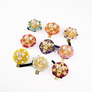 Vibrant Korean hair accessories set with gold floral embellishments and pearl details, ideal for traditional attire.