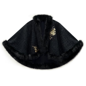 Black gold-detail cape displayed alone