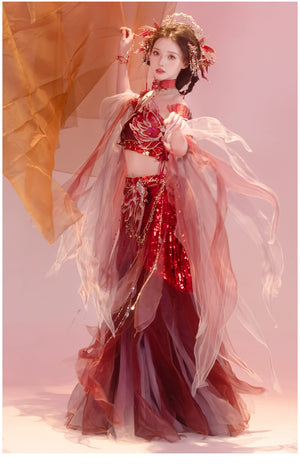 Red Hanfu female Dunhuang embroidery fairy spring and summer dress with flowing layers and soft lighting for ethereal effect.