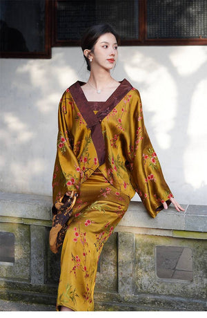 Golden Jelly Dress Set for women with luxurious jacquard fabric and cloud yarn jacket, styled in a serene outdoor setting.