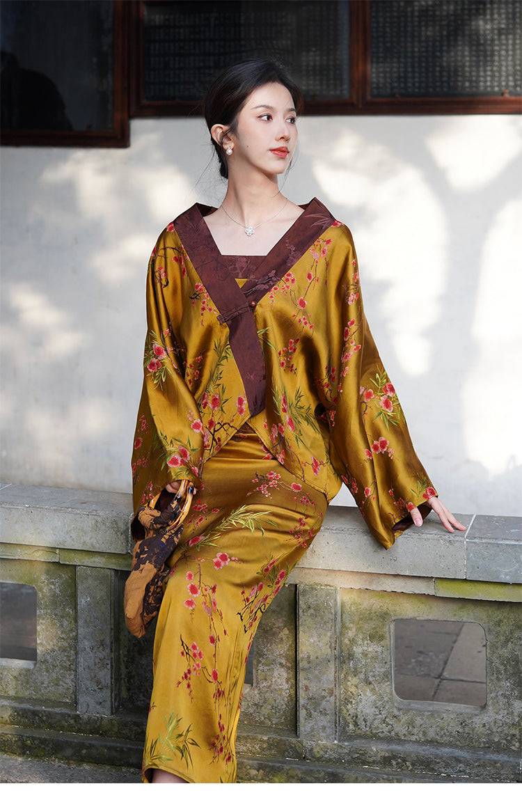 Golden Jelly Dress Set for women with luxurious jacquard fabric and cloud yarn jacket, styled in a serene outdoor setting.