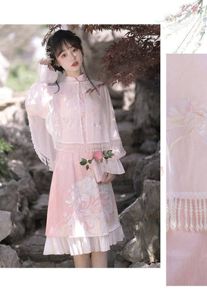 Soft pink Feihua Hanfu Cheongsam Dress with floral embroidery and sheer cape, styled with a peach prop for a romantic look.