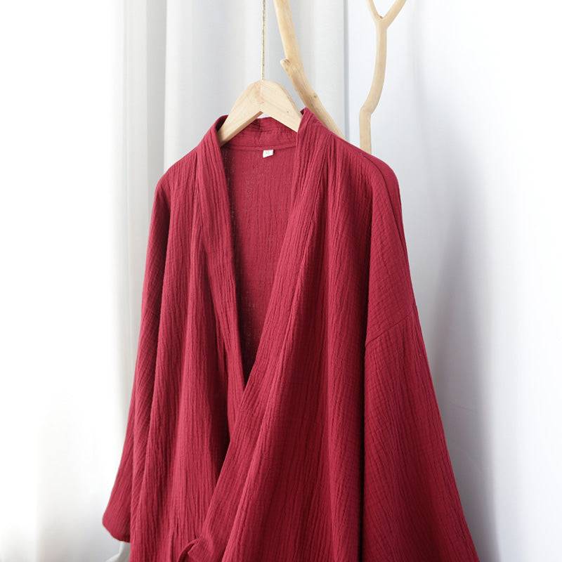 Close-up of red cotton Zen nightgown with a deep V-neck and relaxed Hanfu-style sleeves, showcasing breathable summer pajama fabric.