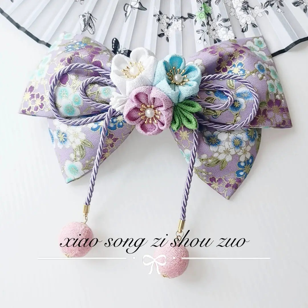 Lavender floral Japanese kimono hair accessory with pastel blossoms and purple tassels, ideal for lolita or cosplay styling.
