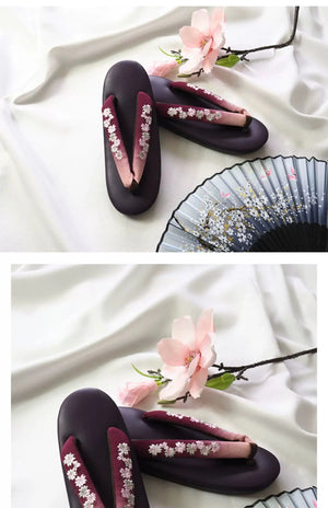 Deep burgundy Japanese kimono sandals with white floral embroidery and gradient herringbone straps. A refined choice for formal and cosplay wear.