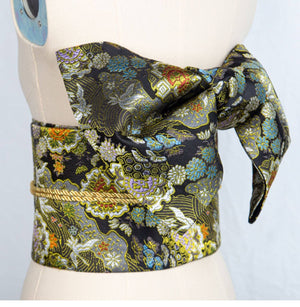 Dark floral brocade bow belt for kimono, featuring gold accents and intricate patterns, ideal for yukata styling and traditional Japanese wear.