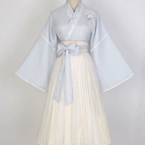 Full view of Blue Modern Hanfu Dress with wide sleeves and lace skirt, perfect for elegant springtime occasions.