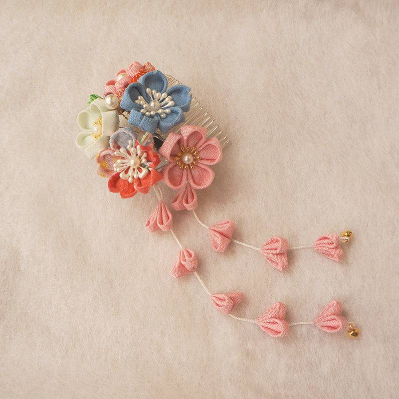 Traditional Japanese crepe hair accessory with floral details and pink hanging petals, ideal for enhancing Hanfu and kimono looks.