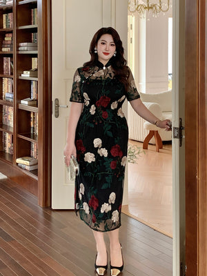 China style plus size cheongsam with intricate floral lace embroidery, modeled in a luxurious home interior.
