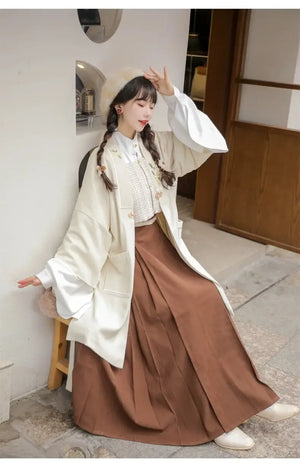 Detail view of Shallow Moon hanfu set highlighting Ming inspired construction and fabric layers.