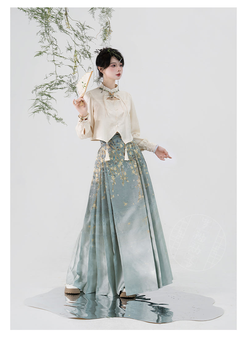 Traditional Hanfu skirt with weeping silk jasmine embroidery, styled with a cream blouse and fan for a historical look.