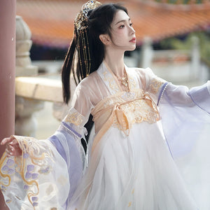 Graceful white Hanfu dress with sheer lavender sleeves and golden embroidery, ideal for spring and autumn daily wear with a fairy-inspired look.