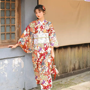 Moonlight kimono in dark red with intricate floral patterns, featuring a traditional Japanese yukata design. Perfect for festivals and cultural events.