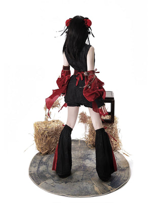 Back view of the four-piece outfit with waist sash