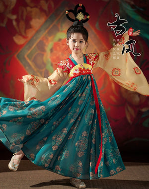Girl modeling Dunhuang-inspired Hanfu with vibrant colors and traditional patterns, perfect for spring and autumn celebrations.