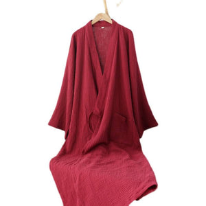 Full view of the red summer Hanfu robe on hanger, made from pure cotton with a loose fit and front pocket, ideal for nightwear or lounging.