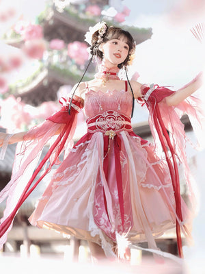 Model twirling in Red Hanfu Dress New Chinese Feather Rust Waist Seal Suspender Skirt with petal-like bodice and layered hem.