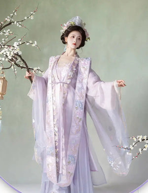 Purple Hanfu women's Song Dynasty embroidered big-sleeved shirt styled with traditional accessories and soft pastel tones.