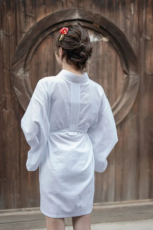 White Yukata Kimono dress for women with feather weaving, showcasing a stylish and breathable fabric. Perfect for traditional and modern wear.