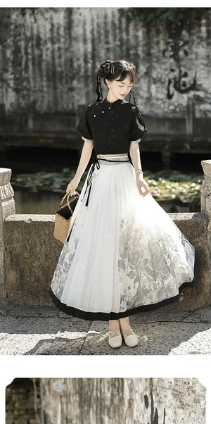 Graceful Chinese black top and floral skirt set styled on bridge, ideal for spring and summer traditional fashion lovers.