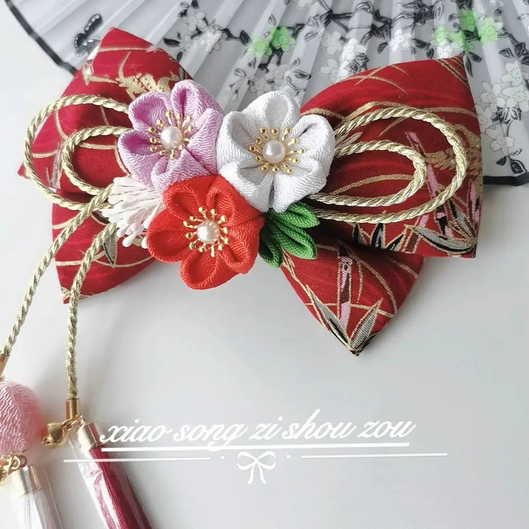 Burgundy Japanese kimono hairpin with red, white, and purple cherry blossoms and gold rope, ideal for traditional or cosplay wear.