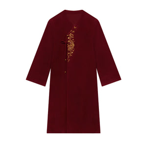 Red floral coat displayed alone