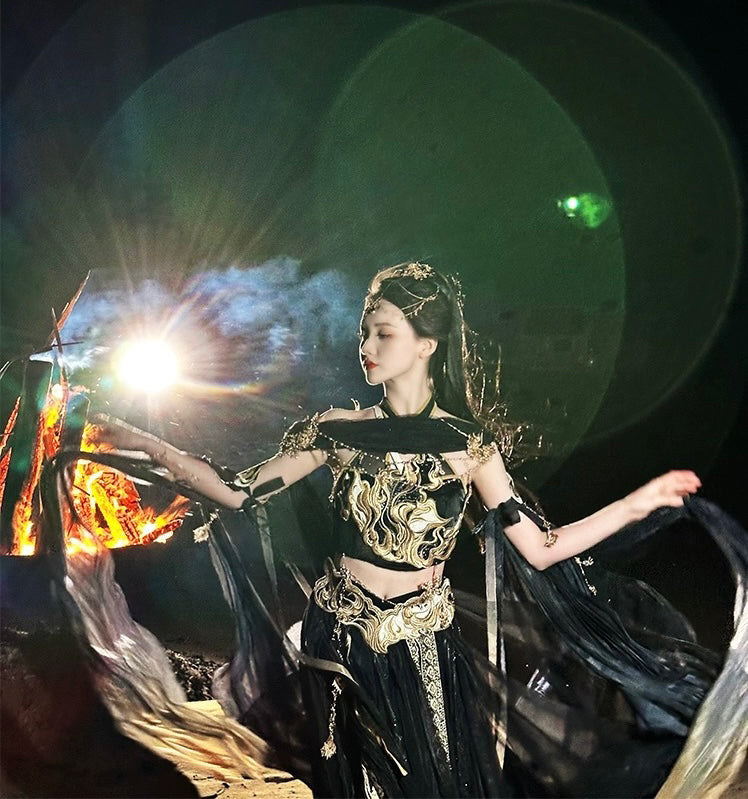Nighttime dance in black Sacred Flame Western Regions Dancer Hanfu Women's Exotic Style, glowing firelight enhances flowing costume details.