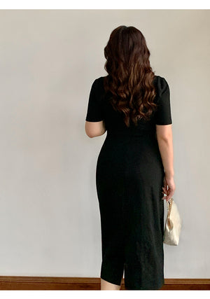 Back view of black plus size Chinese style qipao dress, showing fitted silhouette and elegant midi length design.