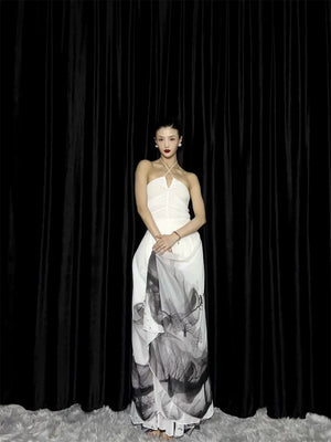 White Chinese watercolor maxi skirt with dramatic full hem by Yandan_Hanfu, model standing in studio