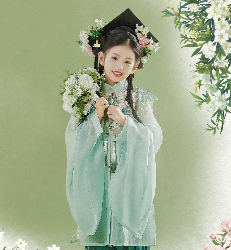 Smiling girl in Green girls Hanfu 2025 children's ancient clothing Chinese style supe with bouquet and floral graduation cap, ideal for festive occasions.