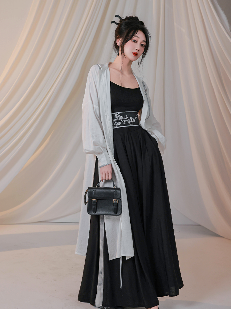Elegant new Chinese style Hanfu with black camisole, embroidered belt, and flowing black skirt paired with a light outer robe for women.
