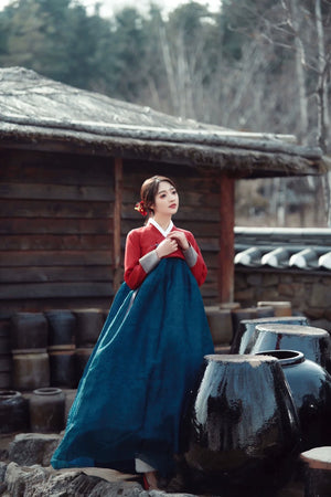 Traditional Hanbok Wedding Dress in red and blue, designed for Korean court-style weddings and national dance performances.