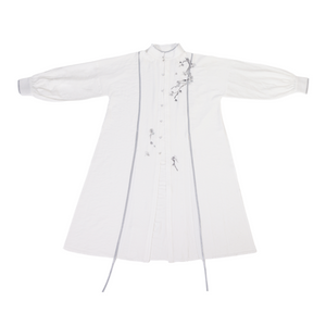 Flat lay of white stand-up collar shirt with plum blossom embroidery, part of a modern Hanfu set for spring and summer wear.