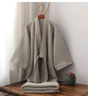 Gray Hanfu loungewear set with thickened trousers on display in a cozy room, emphasizing traditional Chinese style and comfort.