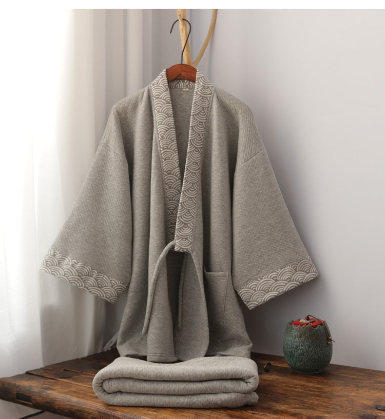 Gray Hanfu loungewear set with thickened trousers on display in a cozy room, emphasizing traditional Chinese style and comfort.