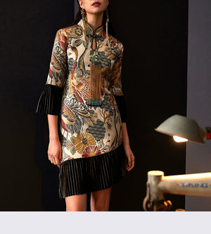 Front view of cheongsam dress with gold jacquard and velvet accents.