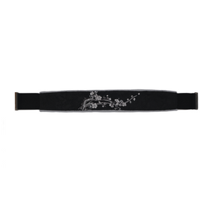 Flat lay of black embroidered waist belt with plum blossom motif, complementing the new Chinese style Hanfu ensemble.