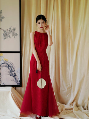 Fitted red bridal cheongsam dress with flared tulle hem, perfect for weddings or engagement celebrations.