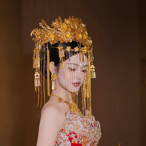 Side view of golden curtain bride headdress showcasing detailed floral elements and hanging ornaments for Chinese bridal wear.