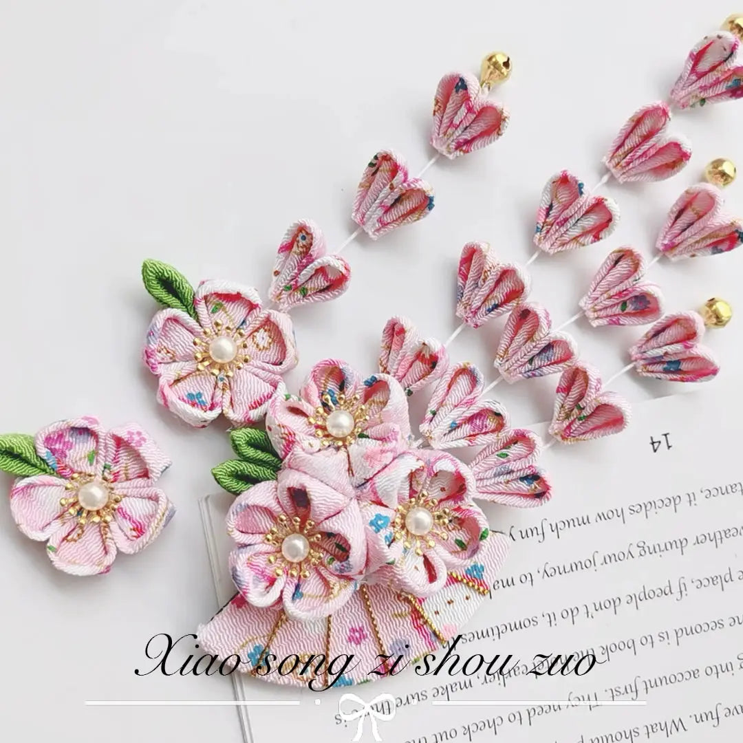 Pink floral kimono hairpin set with fan-shaped five-petal flowers and cascading tassels, perfect for Japanese traditional wear.
