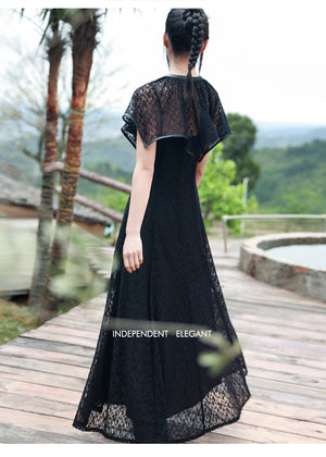 Back view of Dark Gothic Shawl Women's Summer Vintage Irregular Lace Short Cloak with flowing lace dress labeled 'Independent Elegant'.