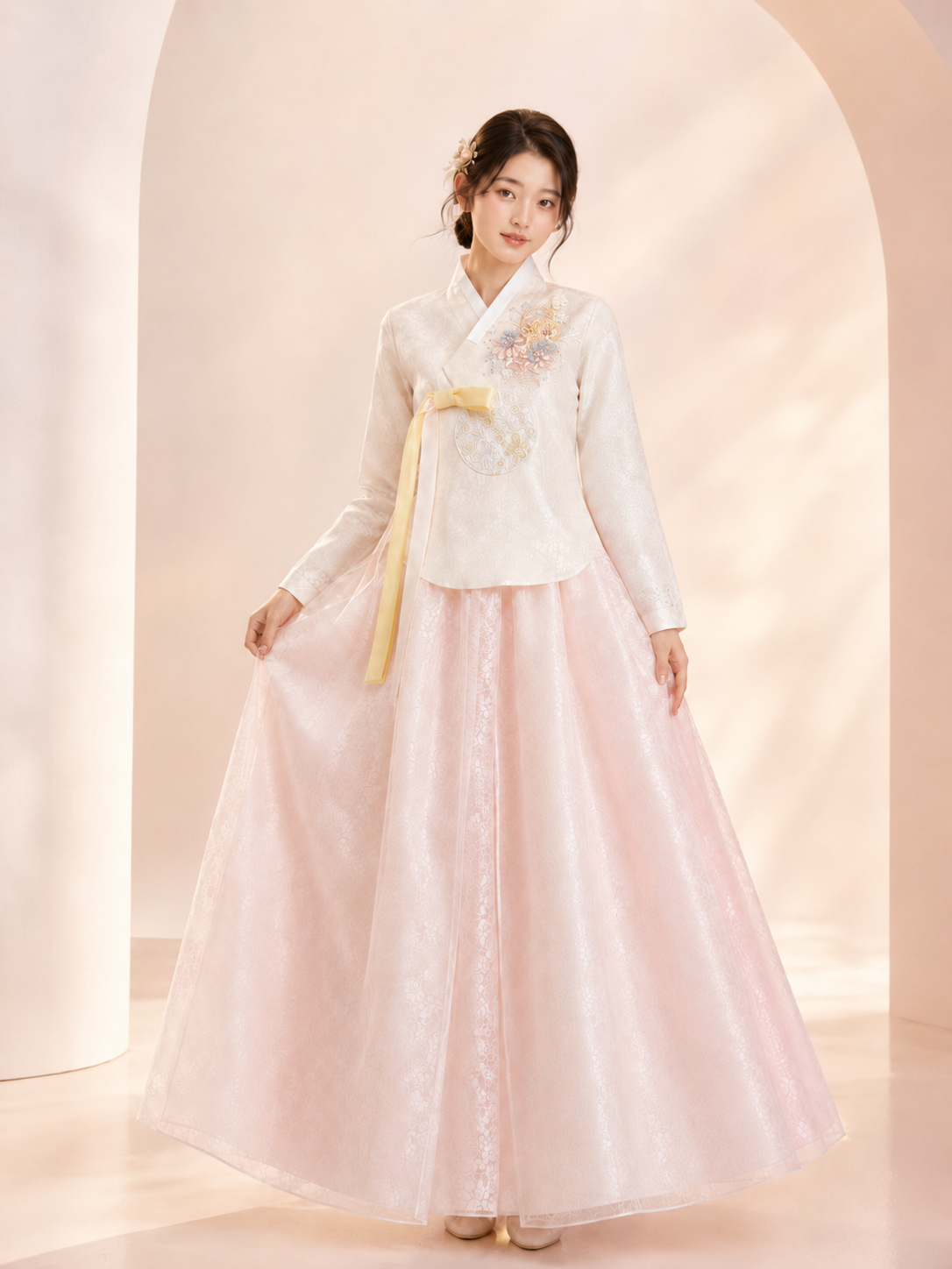 Women hanbok white long sleeve jeogori and blush pink full chima skirt with yellow bow elegant bridal style for bride front view