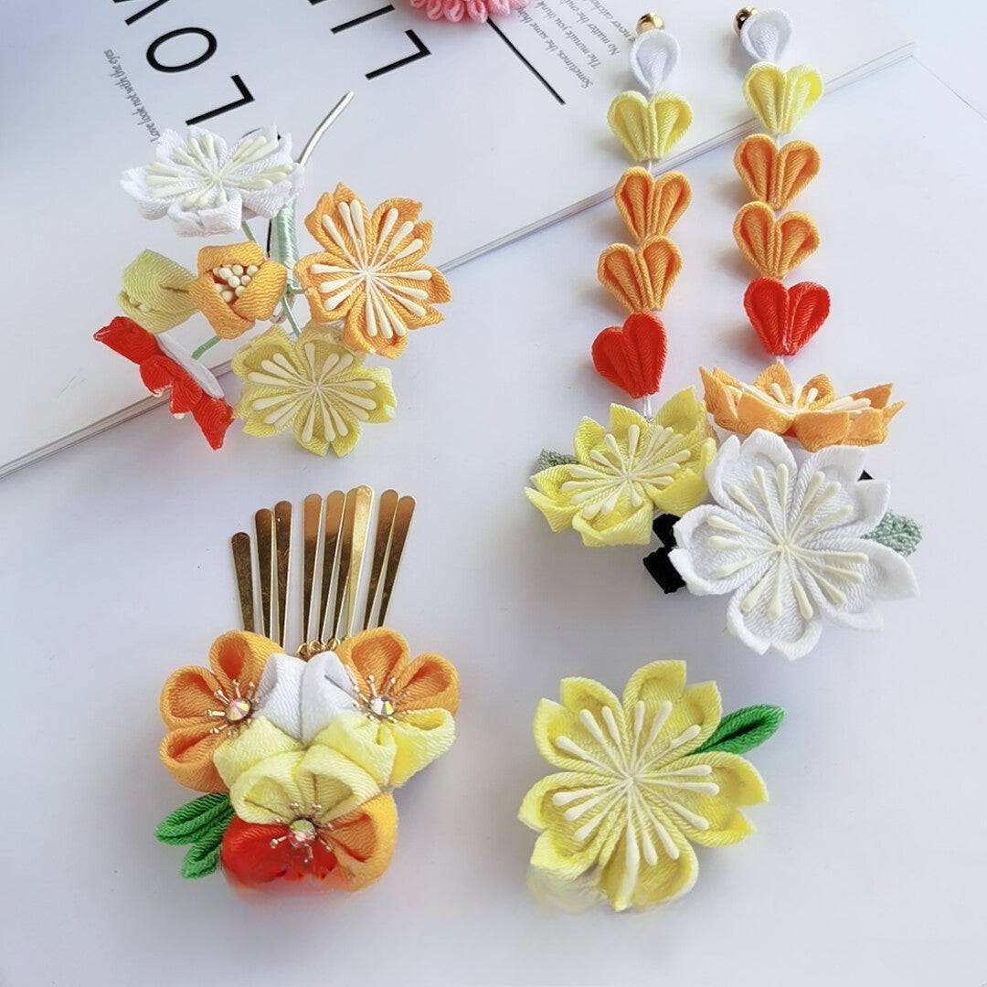 Yellow and orange Sakura hairpin 4-piece set with floral designs, ideal for kimono or yukata styling.