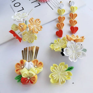 Yellow and orange Sakura hairpin 4-piece set with floral designs, ideal for Japanese yukata or kimono styling.