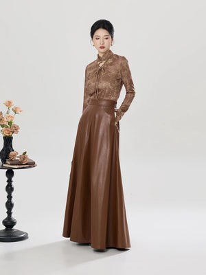 Brown top and faux-leather skirt, standing view