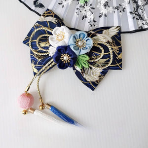 Navy blue Japanese kimono hair accessory with white and blue cherry blossoms and tassels, perfect for elegant traditional wear.