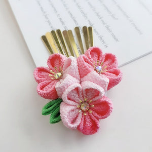 Gold comb hairpin with vibrant pink and white cherry blossoms, ideal for Lolita or kimono fashion.